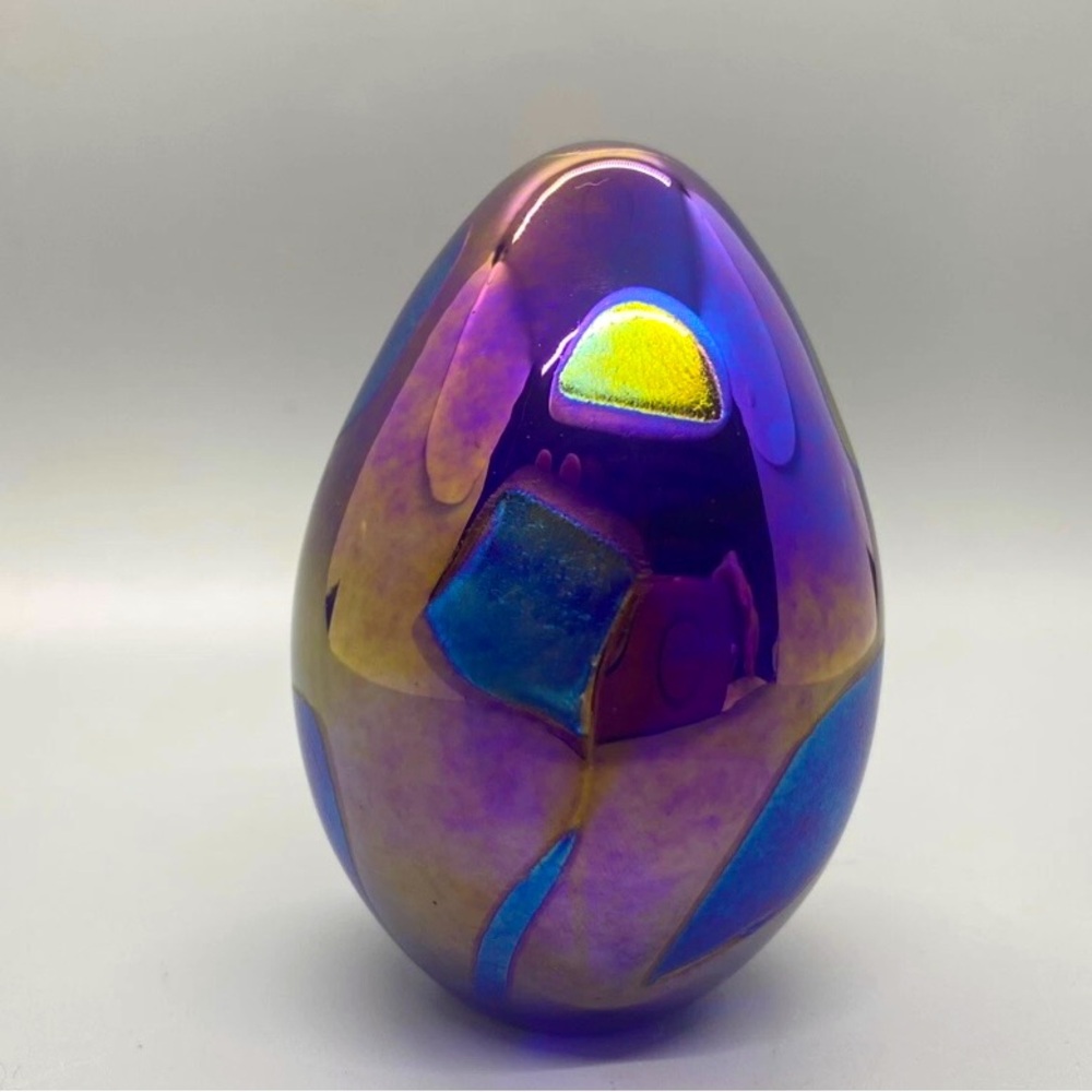 Elegant Iridescent Glass Egg with Purple and Blue Hues